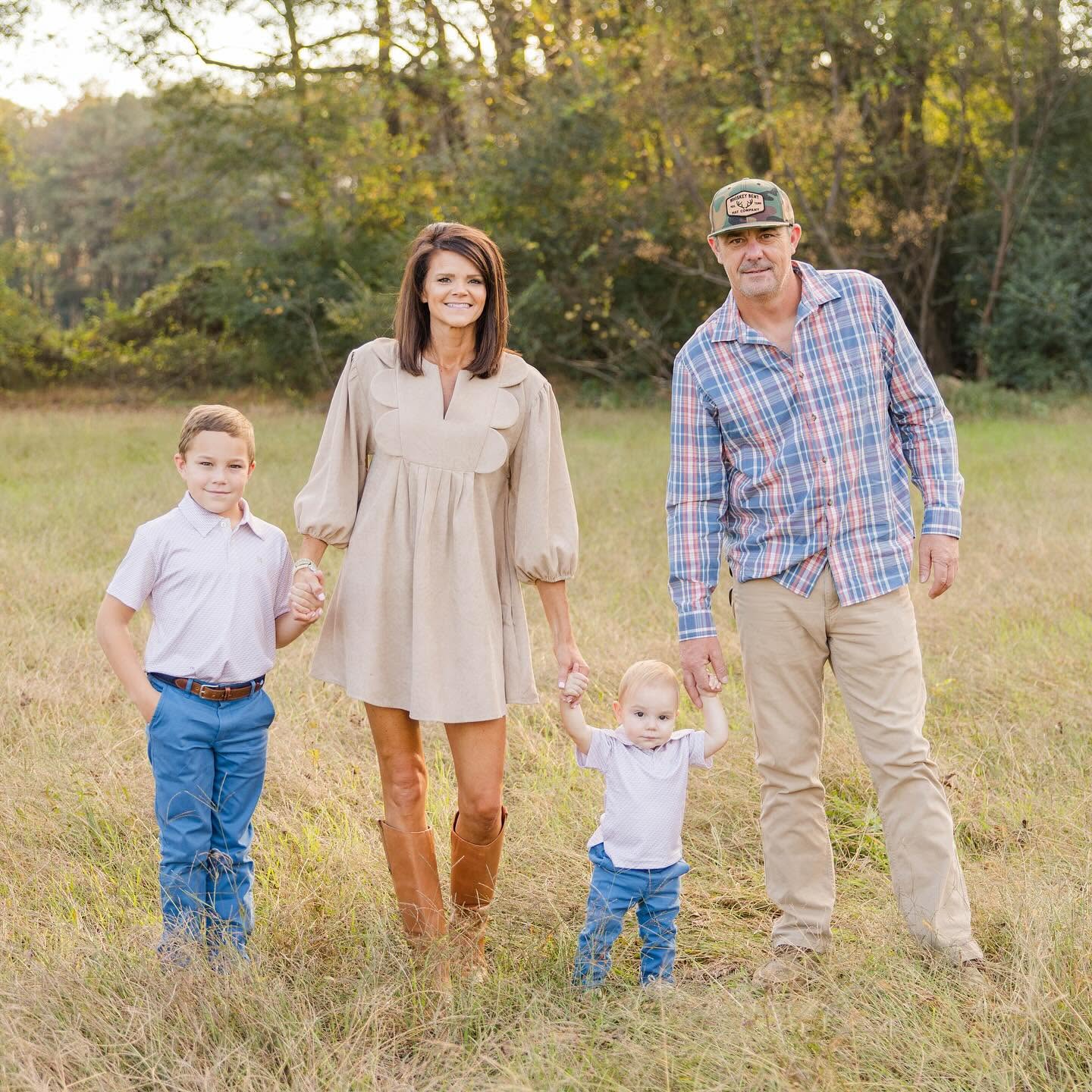 Shion McIntosh with his wife and two sons in a North Carolina field